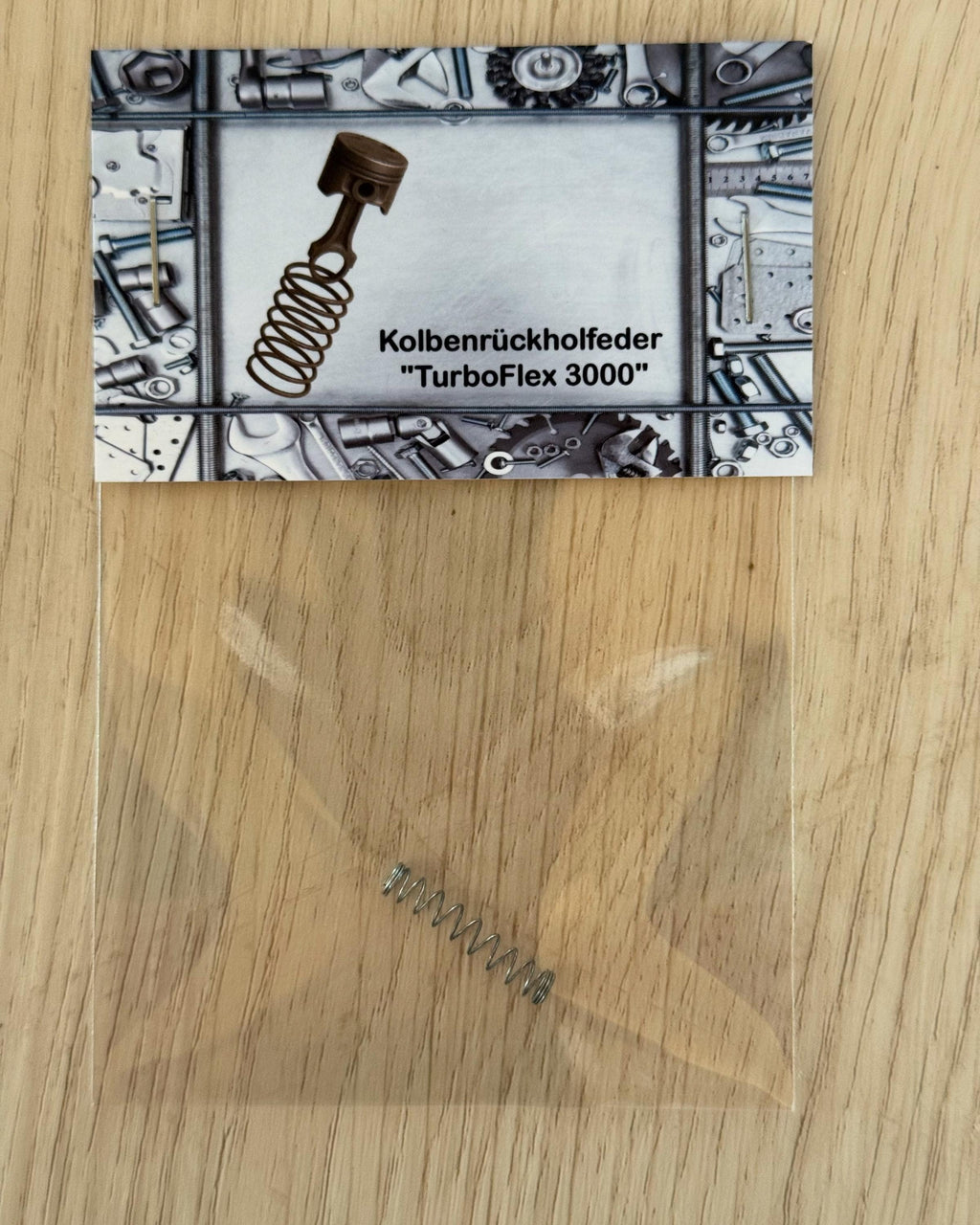 Kolbenrückholfeder KFZ Geschenke Auto Werstatt Azubi Scherzartikel Car Feder Lustig Kolben